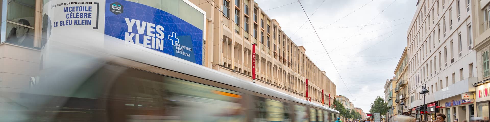 Nice Etoile Shopping Center featuring railway items and a city