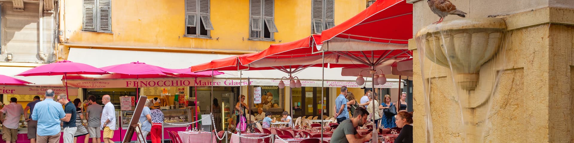 Place Rossetti which includes a fountain and outdoor eating as well as a small group of people