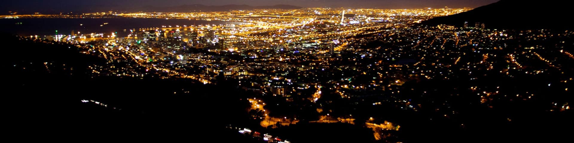 Cape Town which includes night scenes and a city