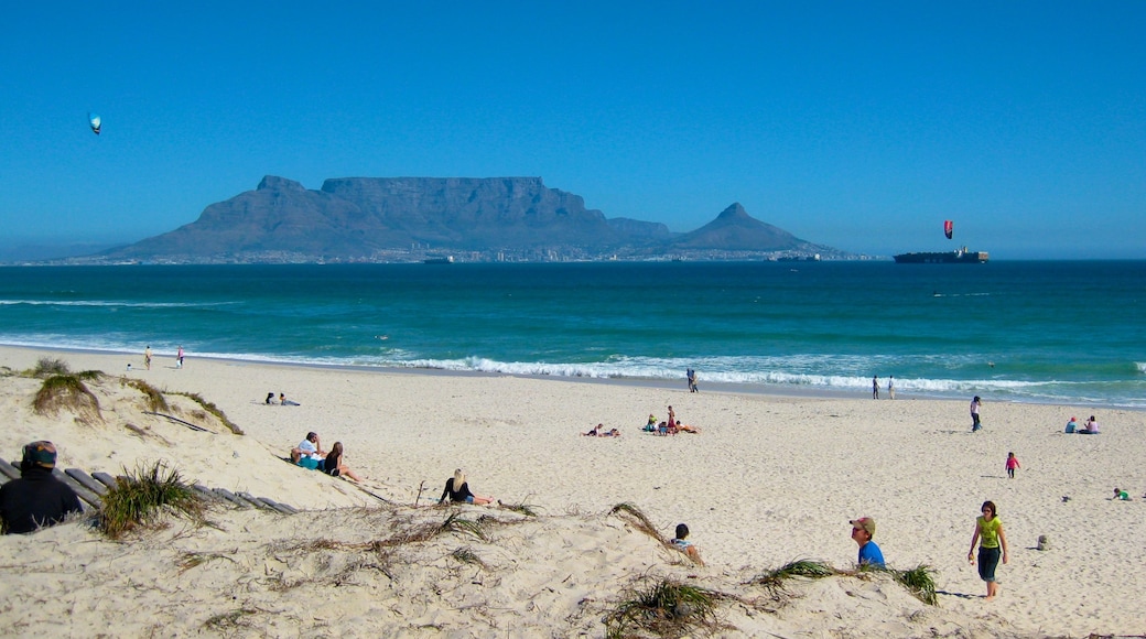 Table Mountain which includes mountains, a beach and landscape views