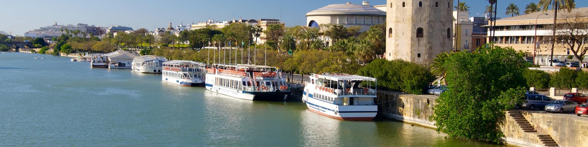 Province of Seville which includes a bay or harbor, a city and a marina