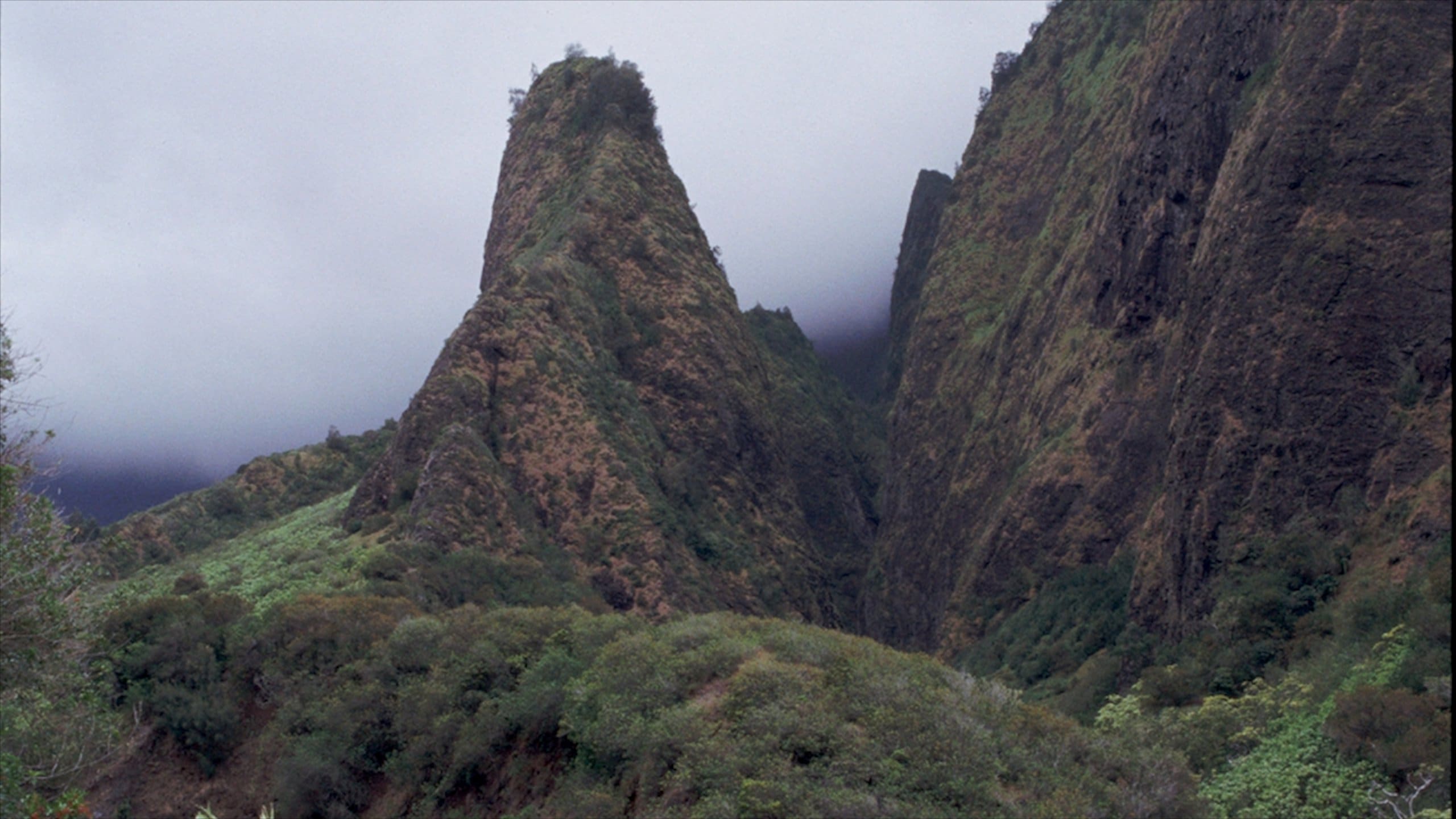 Wailuku which includes mountains, mist or fog and landscape views