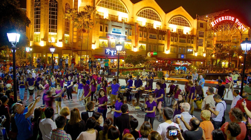 Clarke Quay which includes nightlife, a city and performance art