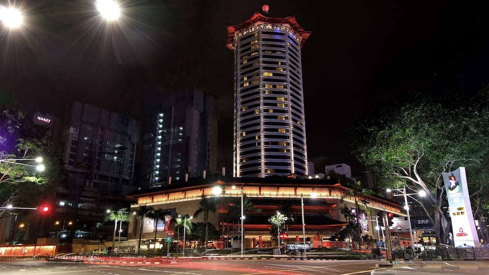 Orchard Road showing a city and night scenes