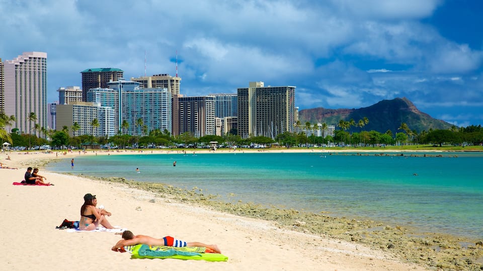 Ala Moana Beach Park featuring a coastal town, a sandy beach and views
