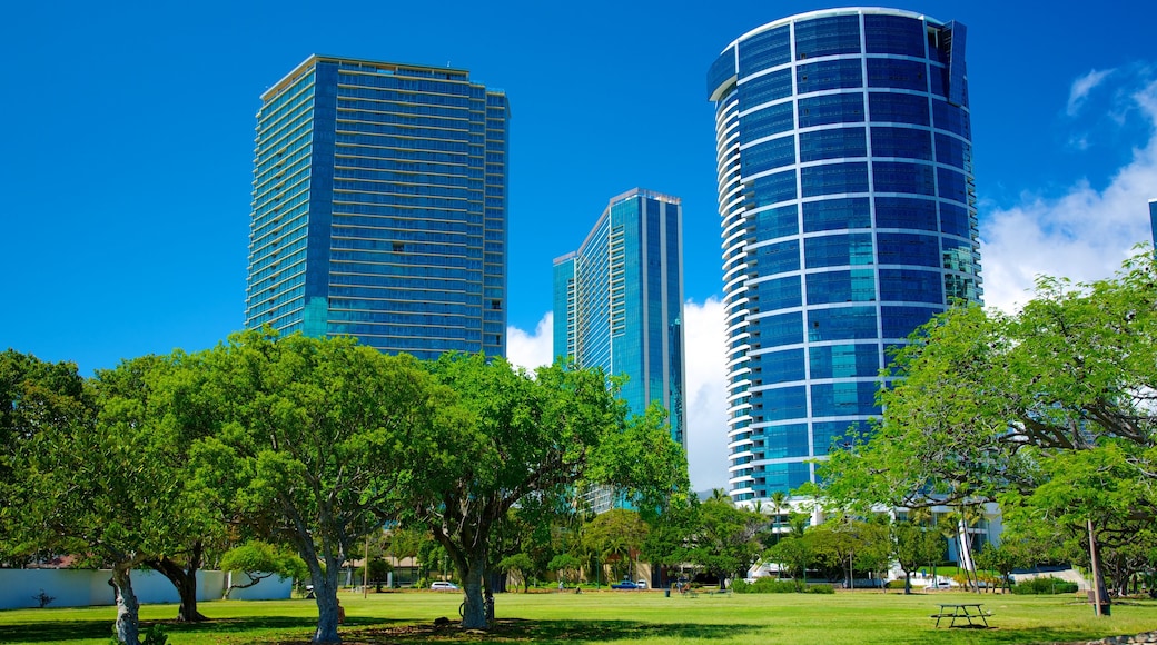 Ala Moana Beach Park which includes modern architecture, a skyscraper and a city