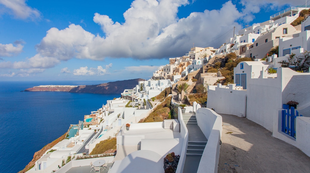 Fira which includes a coastal town and general coastal views