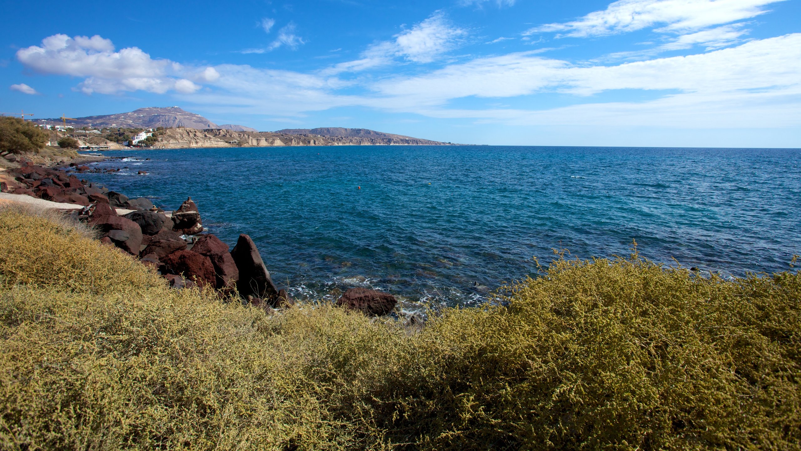 Santorini showing landscape views and rocky coastline