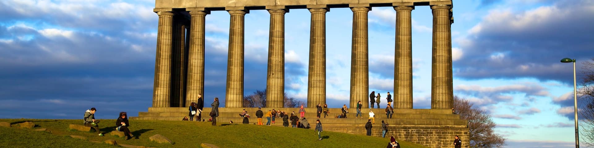 Calton Hill which includes heritage architecture, a monument and hiking or walking