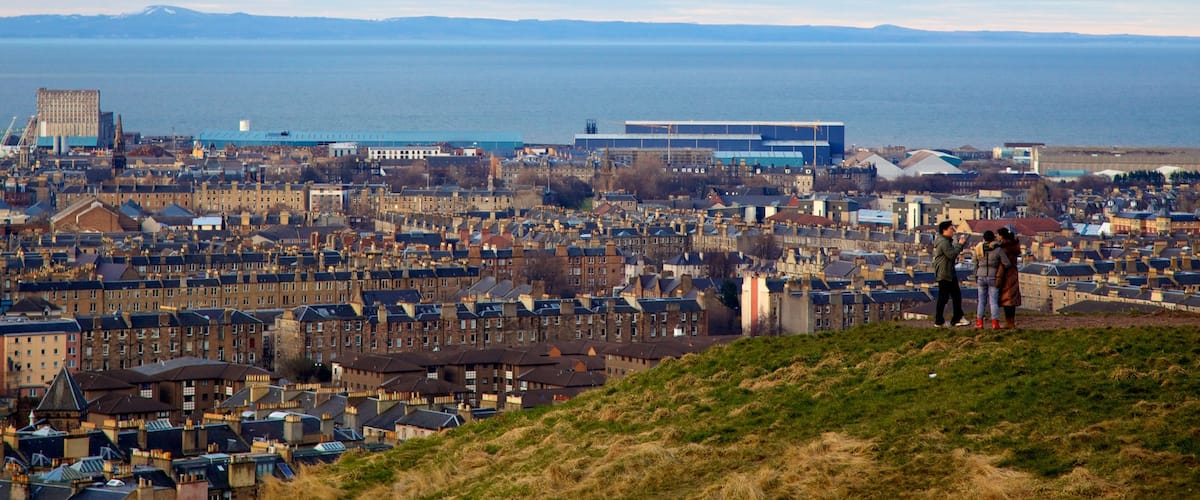 Calton Hill which includes general coastal views, a city and skyline
