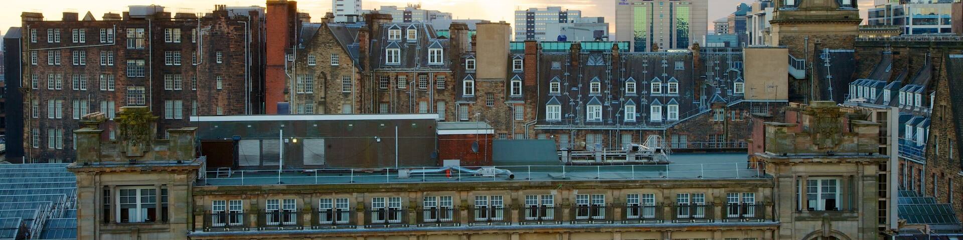 The Lighthouse featuring a sunset, heritage architecture and a city