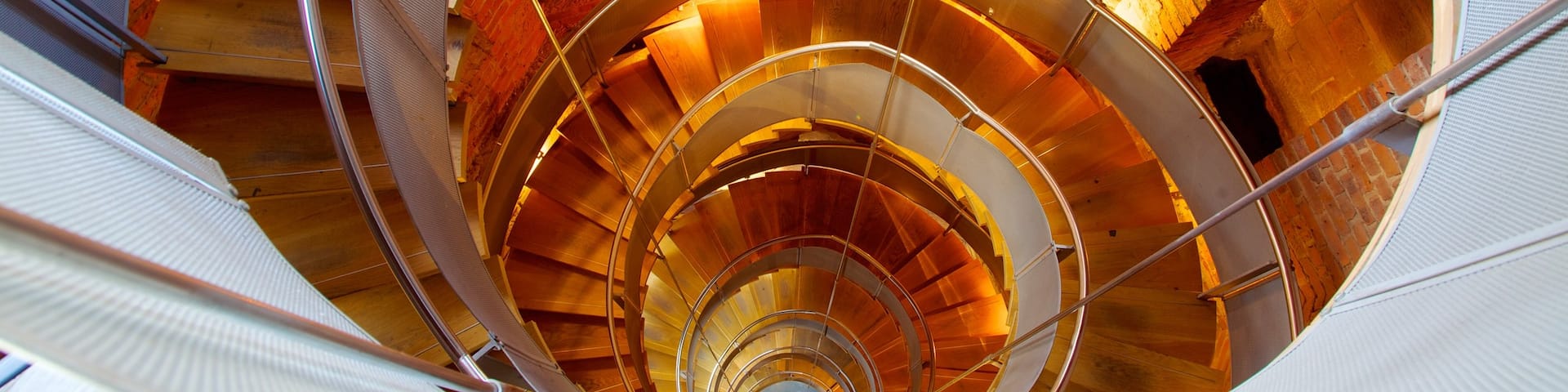 Lighthouse featuring a lighthouse and interior views