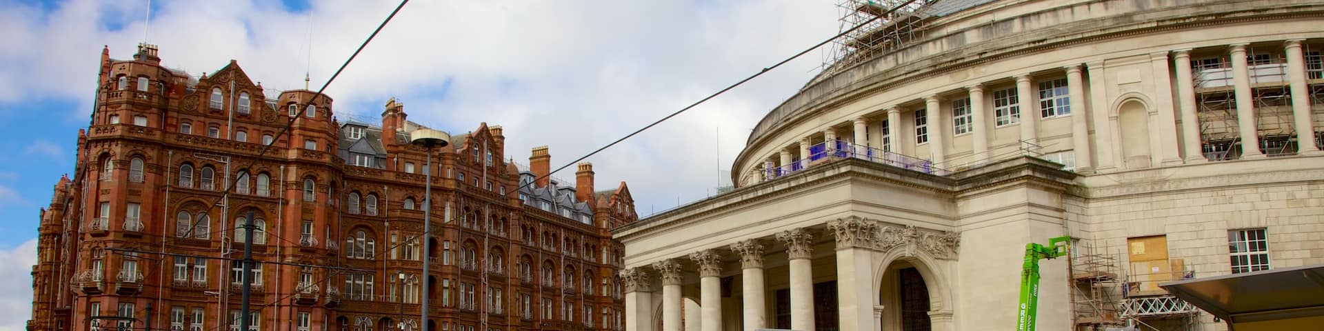 St. Peter\\\'s Square featuring a city and heritage architecture as well as an individual male