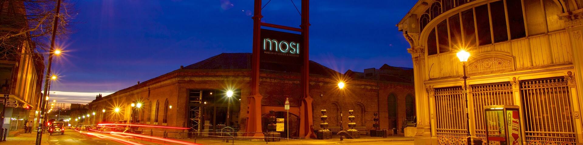 Museum of Science and Industry featuring a sunset, night scenes and a city