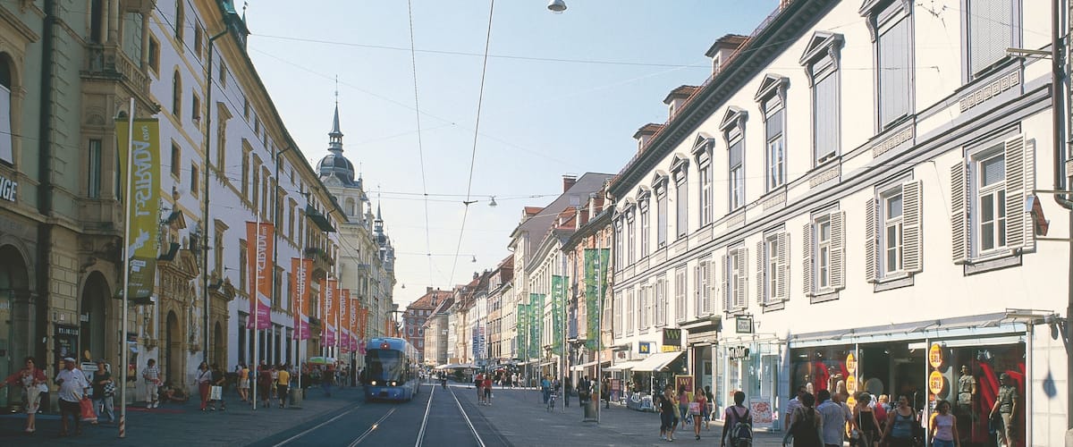 Graz showing street scenes and a city