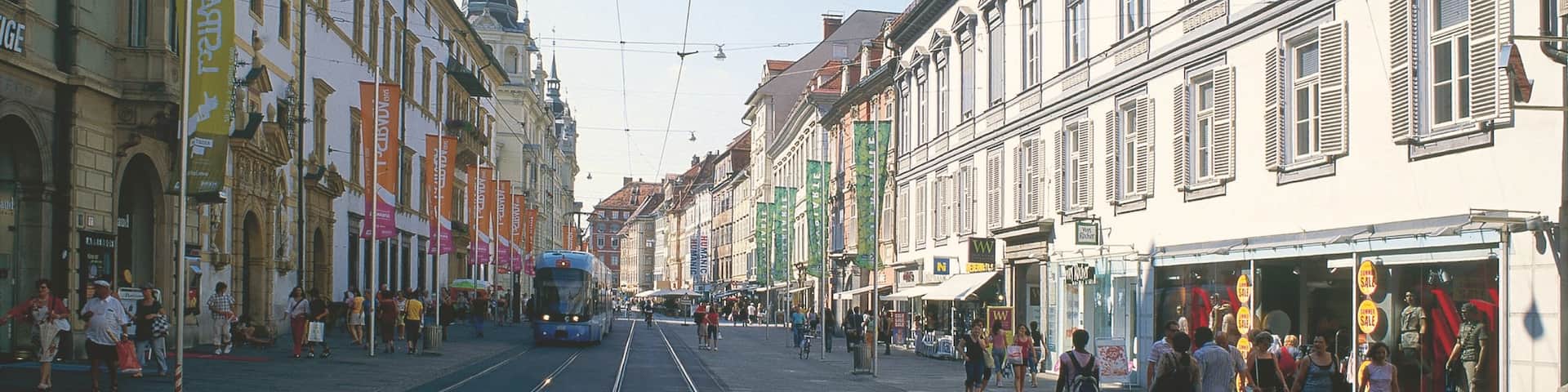 Graz showing street scenes and a city