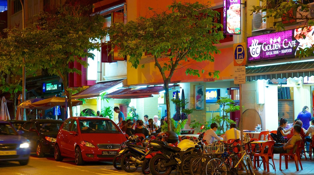 Boat Quay which includes outdoor eating, a city and a house