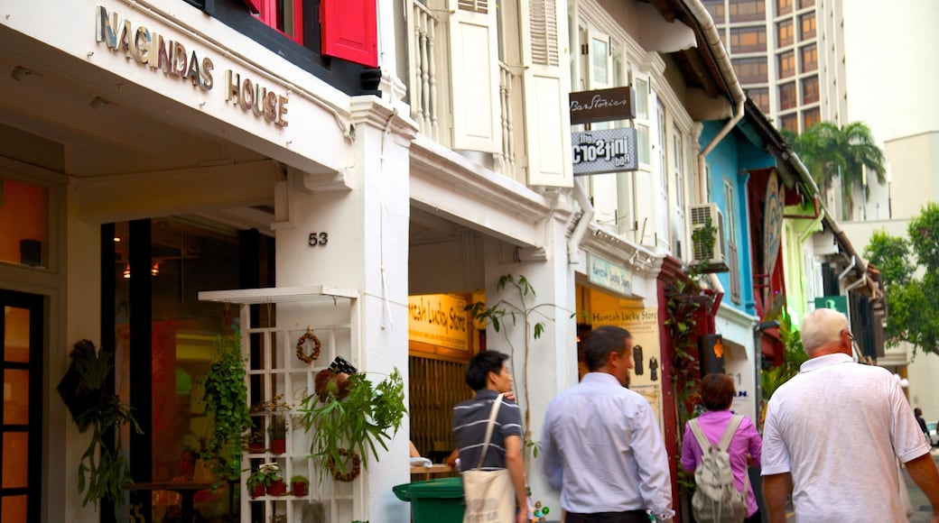 Haji Lane featuring signage, street scenes and a city