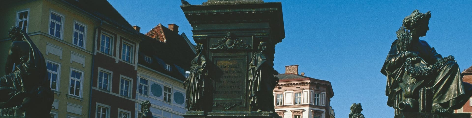 Graz Main Square which includes a city and a statue or sculpture