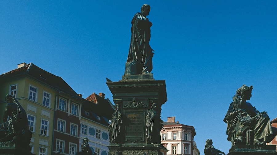 Graz Main Square showing a city and a statue or sculpture