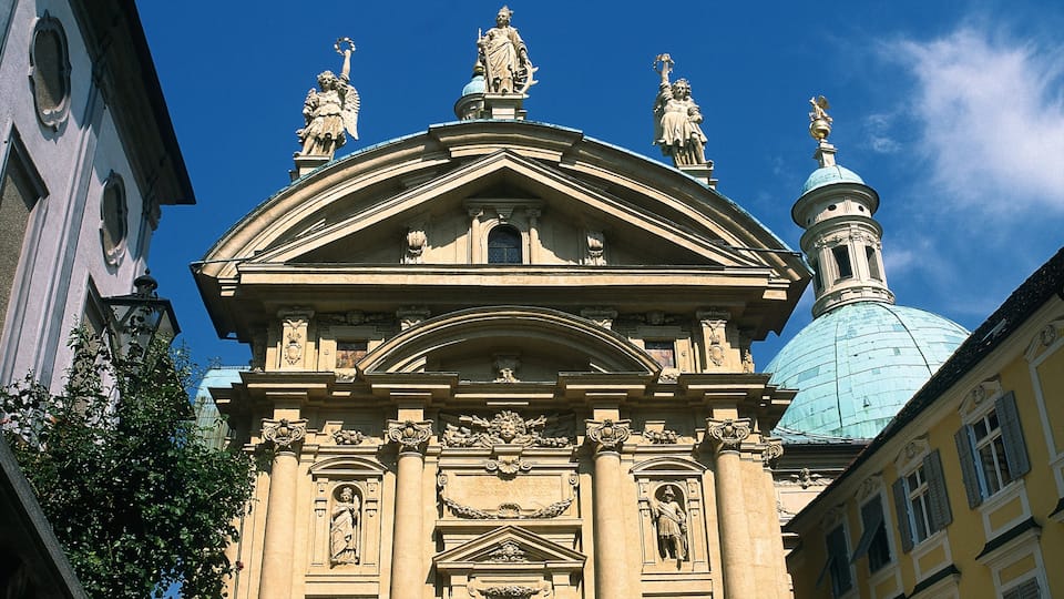 Mausoleum of Emperor Ferdinand II. showing a city, heritage architecture and a monument