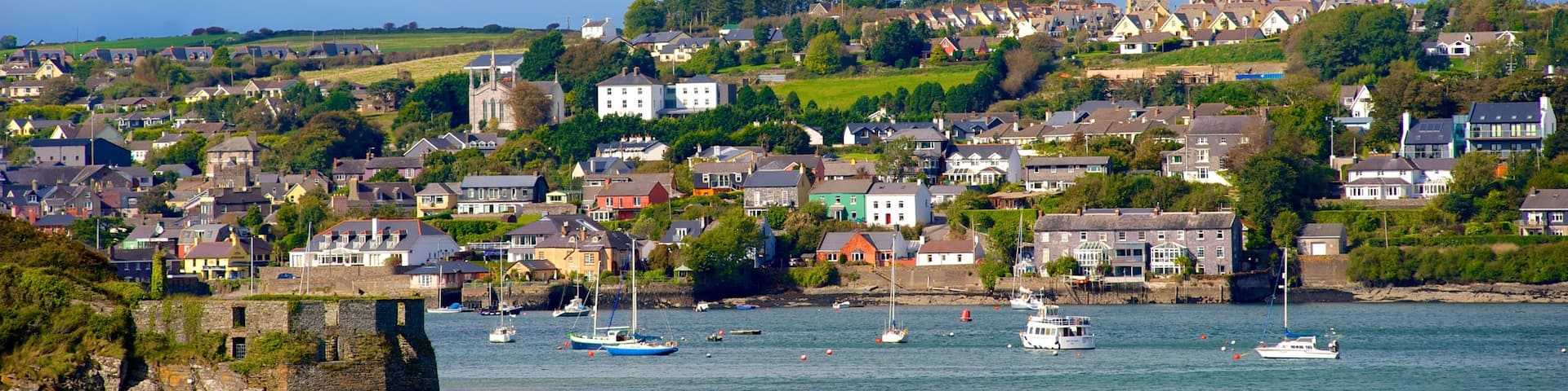 Charles Fort featuring boating, a coastal town and a bay or harbour