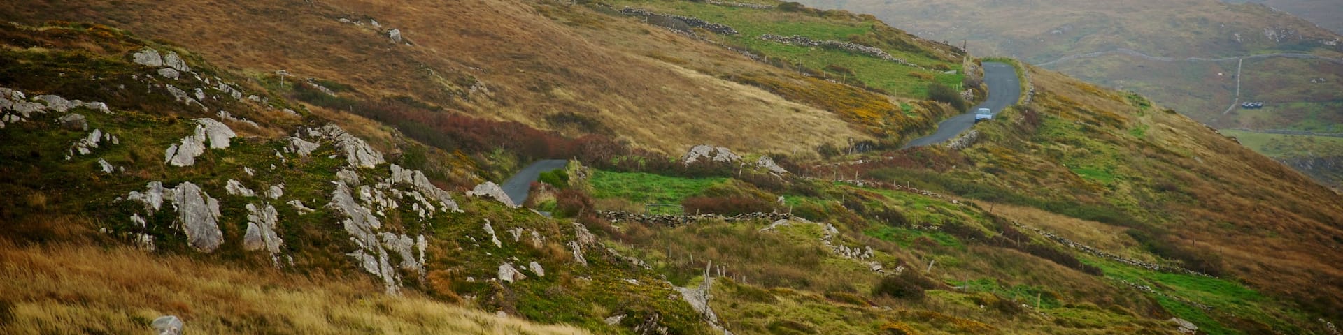 Clifden featuring mist or fog, tranquil scenes and mountains