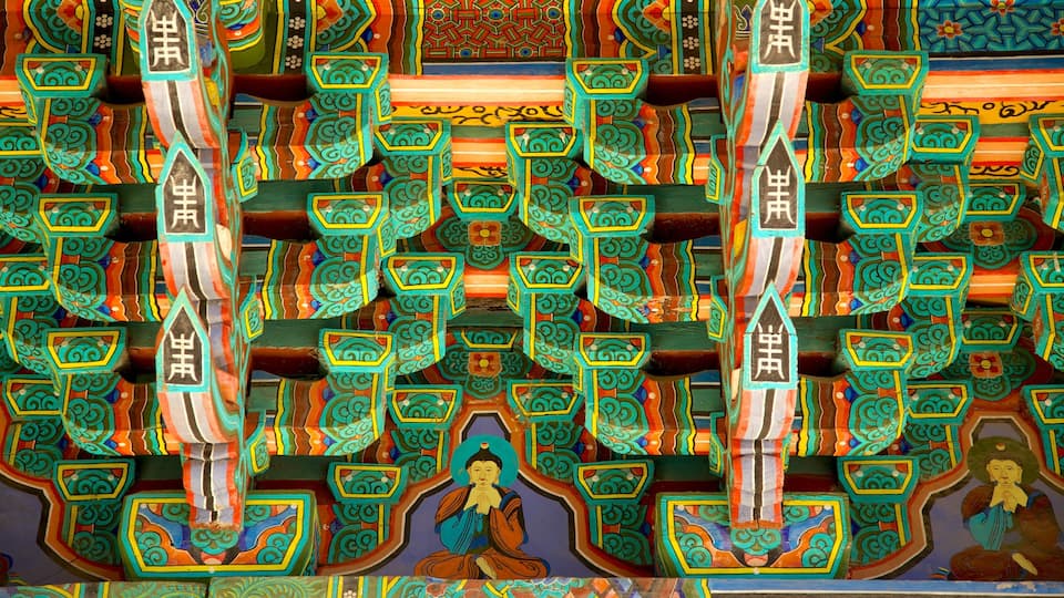 Sinheungsa Temple featuring religious elements and interior views