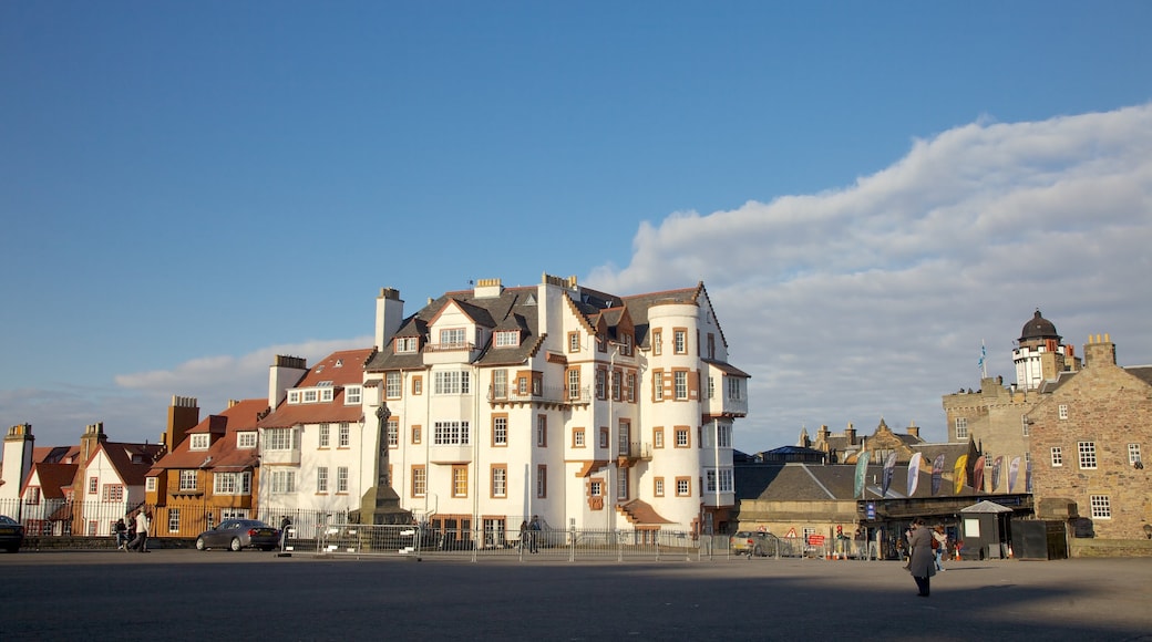 Royal Mile which includes heritage architecture and a house