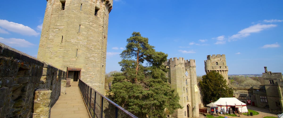 Warwick Castle featuring heritage architecture and a castle