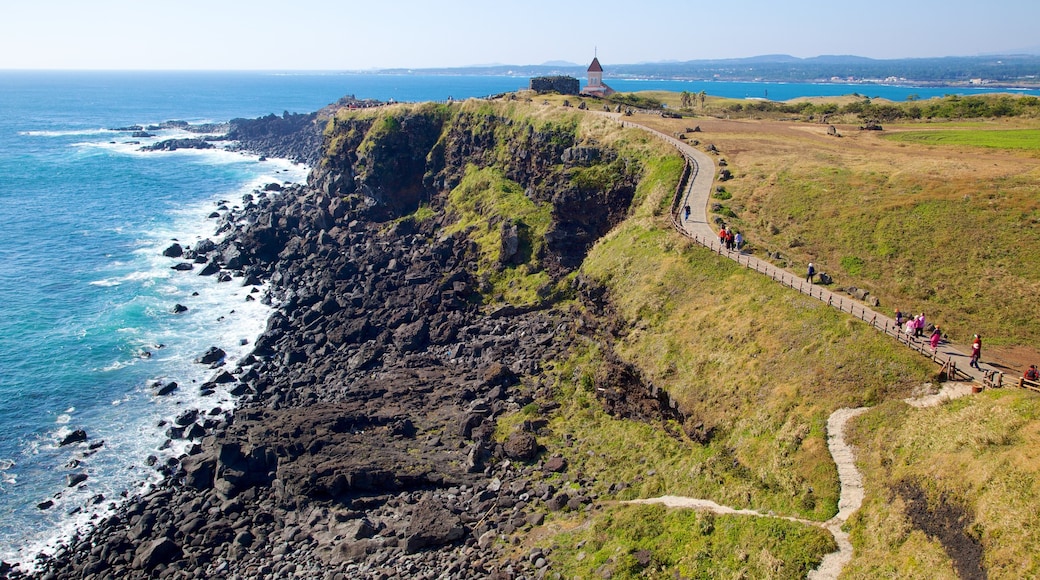 Jeju Island which includes rugged coastline, landscape views and tranquil scenes