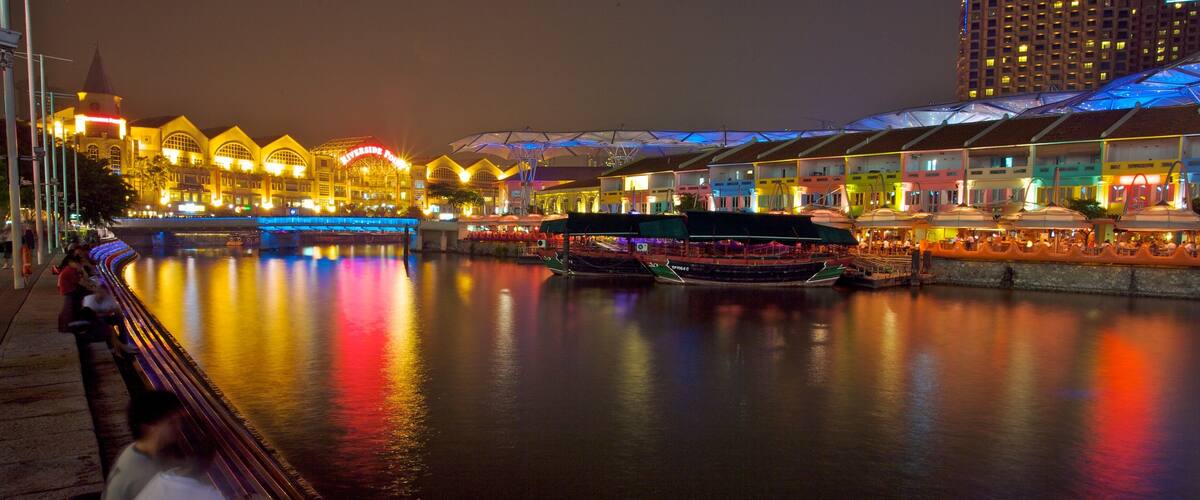 Clarke Quay Mall showing boating, night scenes and a city