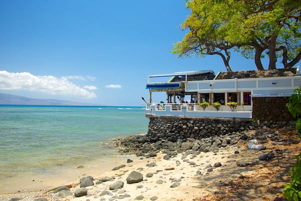 Lahaina featuring a coastal town, a beach and a pebble beach