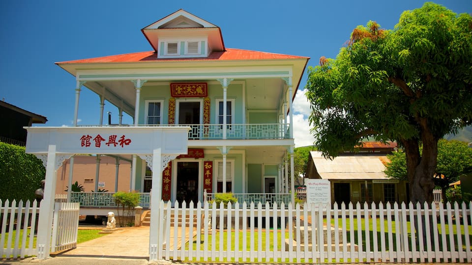 Lahaina featuring signage, a house and heritage architecture