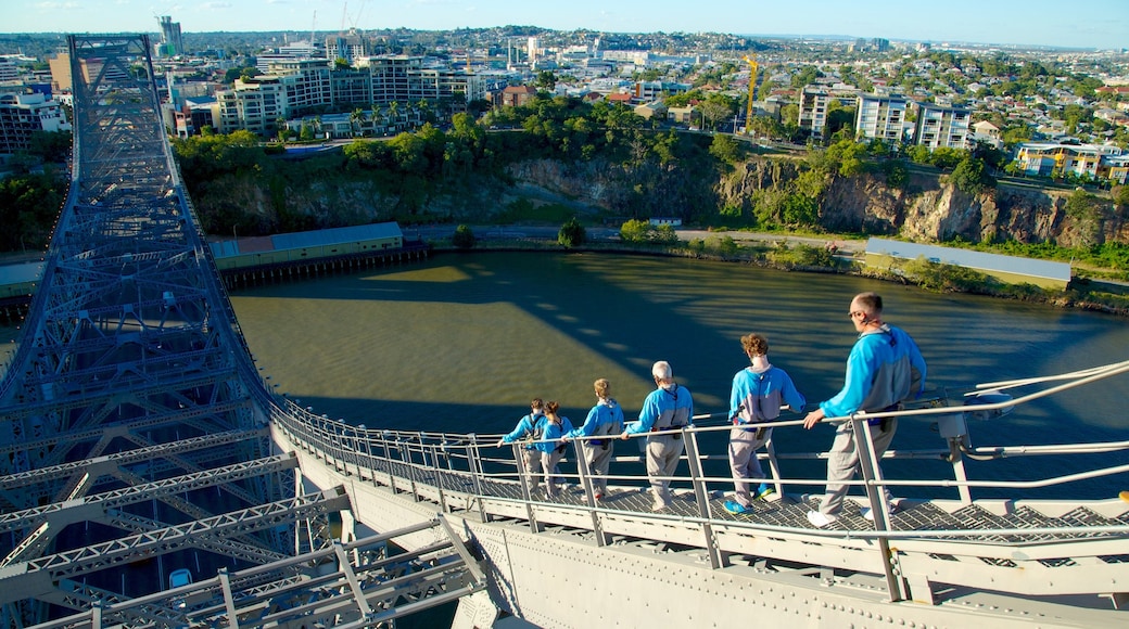 Story Bridge which includes a bridge, a city and skyline