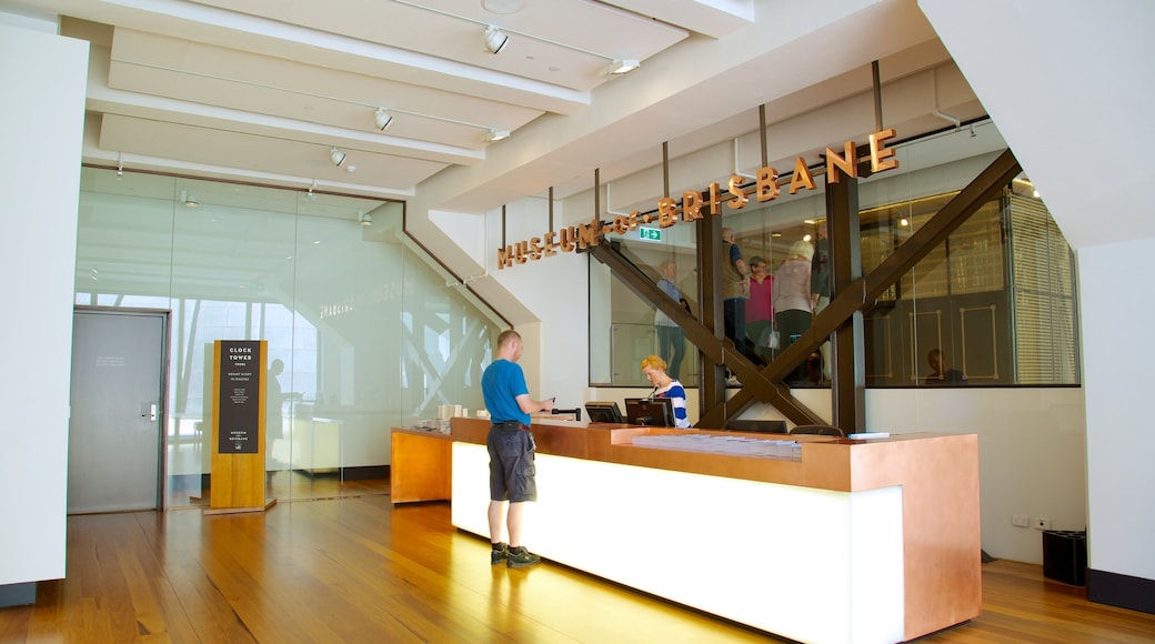 Museum of Brisbane featuring interior views and signage