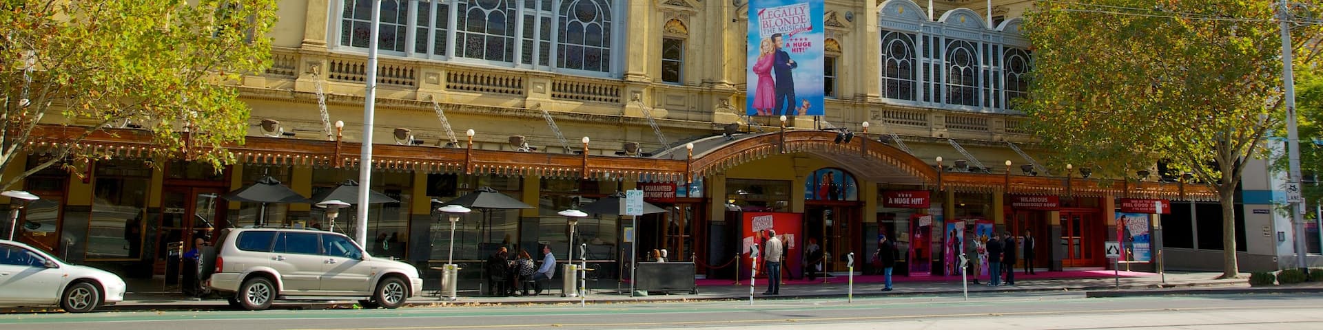 Princess Theatre showing street scenes, a high rise building and theater scenes