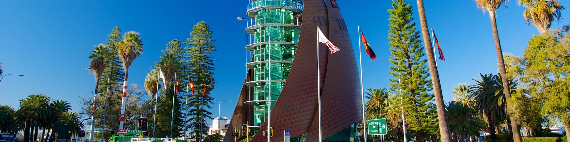 Swan Bells Belltower showing modern architecture, a high-rise building and a city