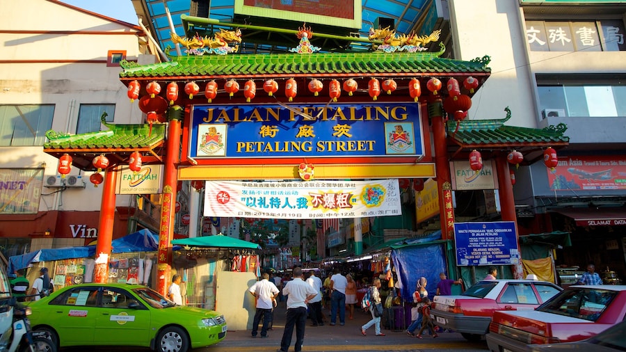 Petaling Street which includes markets, street scenes and a city