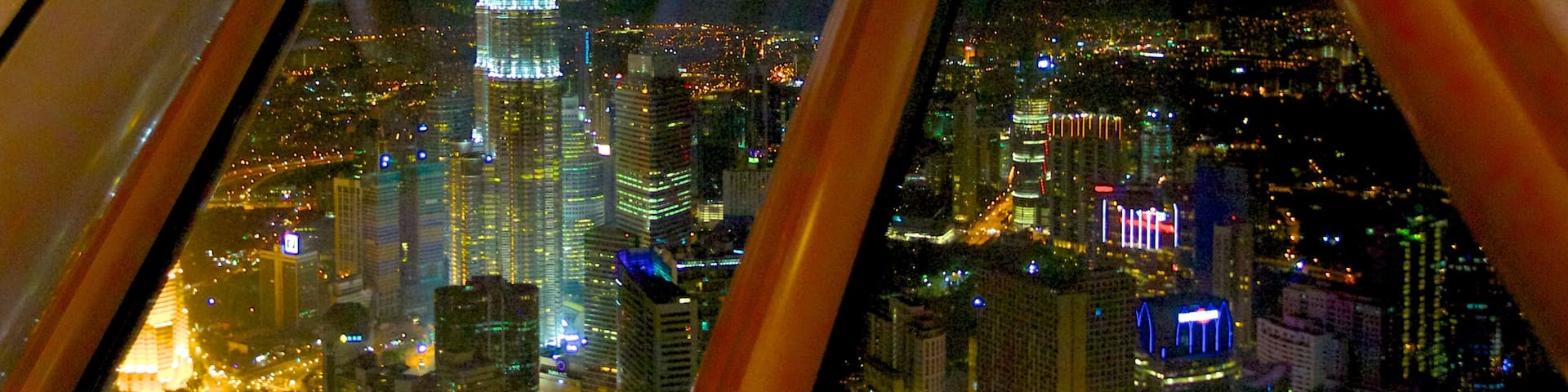 Kuala Lumpur Tower which includes night scenes, views and a skyscraper