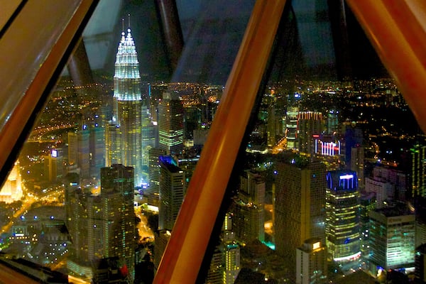 Kuala Lumpur Tower featuring night scenes, a city and a skyscraper