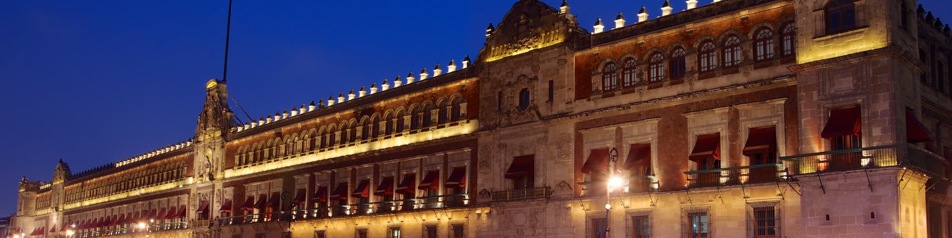 Palacio Nacional featuring a city, night scenes and heritage architecture