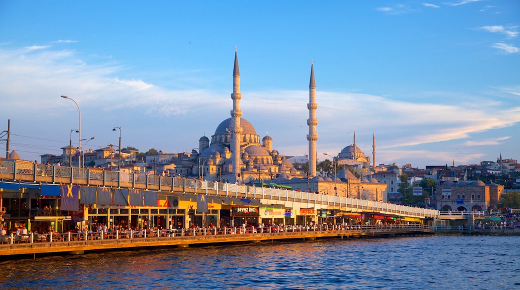 Galata Bridge which includes a bridge, a monument and a bay or harbour