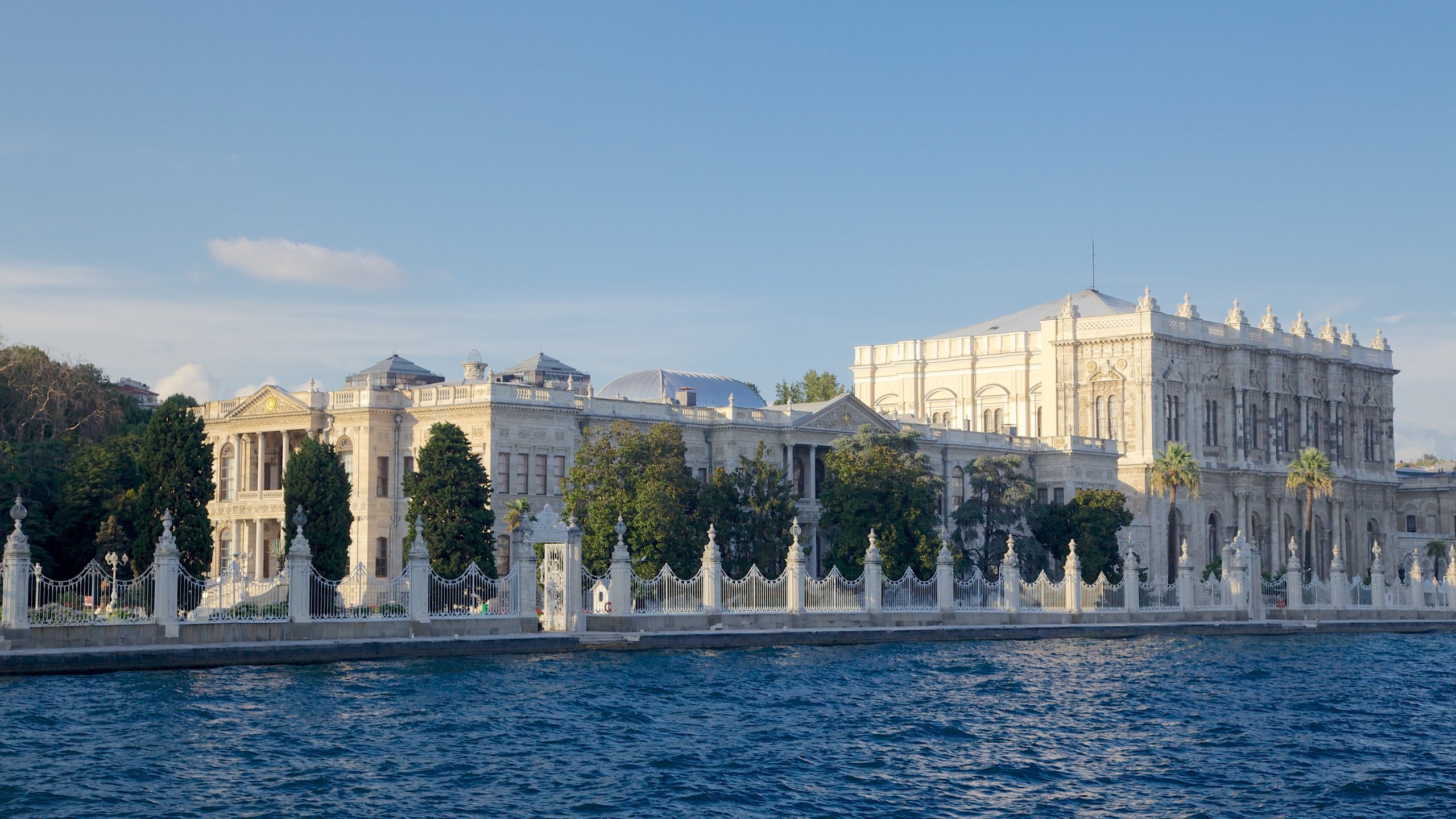 Dolmabahce Palace featuring a river or creek, heritage architecture and a castle