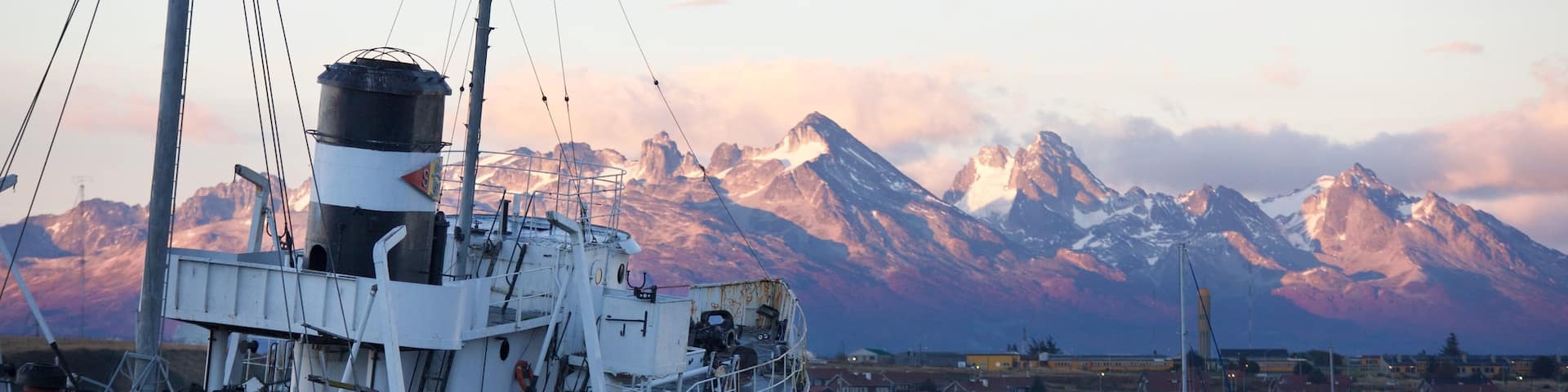 St. Christopher Shipwreck showing a sunset and a bay or harbor