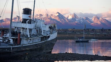 St. Christopher Shipwreck showing a sunset and a bay or harbor