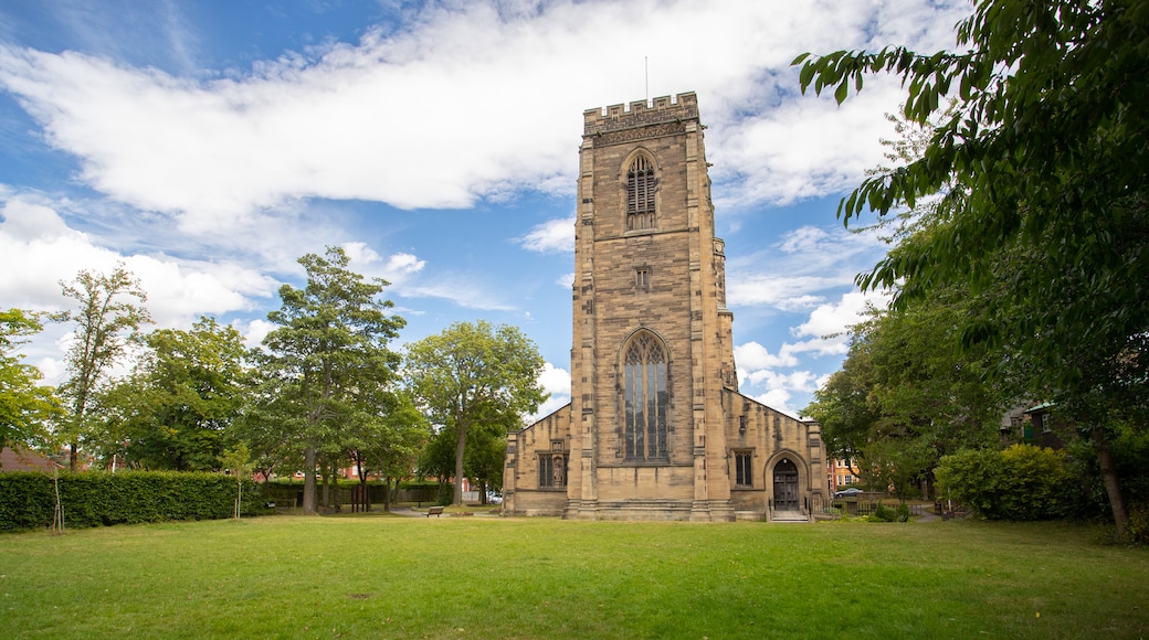 All Saints Church featuring heritage architecture and a church or cathedral