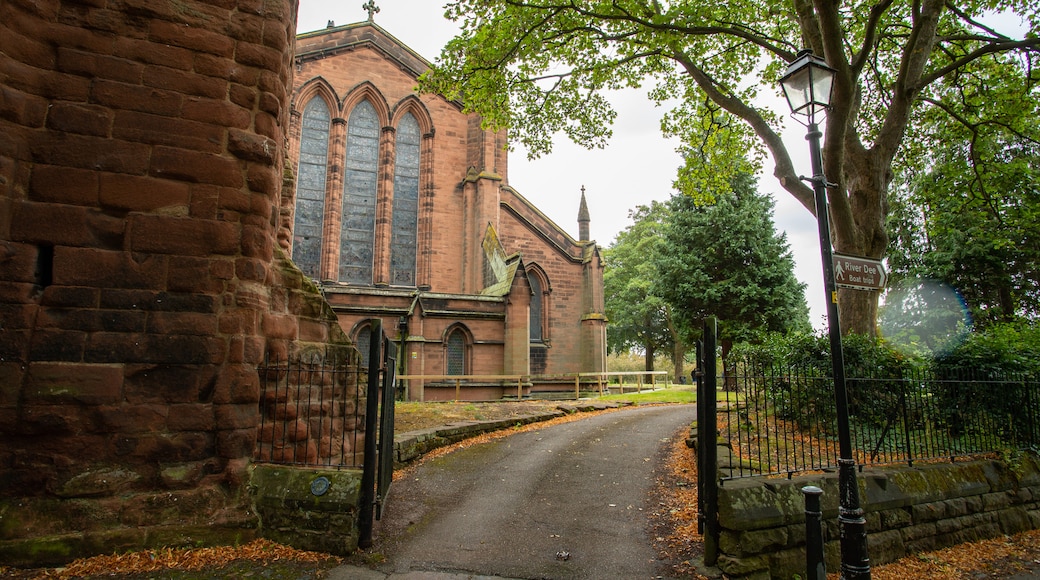 St John the Baptist Church which includes a church or cathedral, autumn leaves and heritage elements