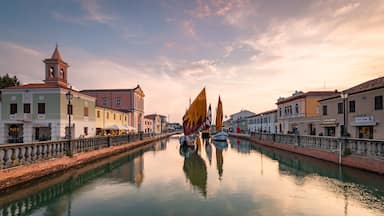 Cesenatico which includes a sunset and a river or creek