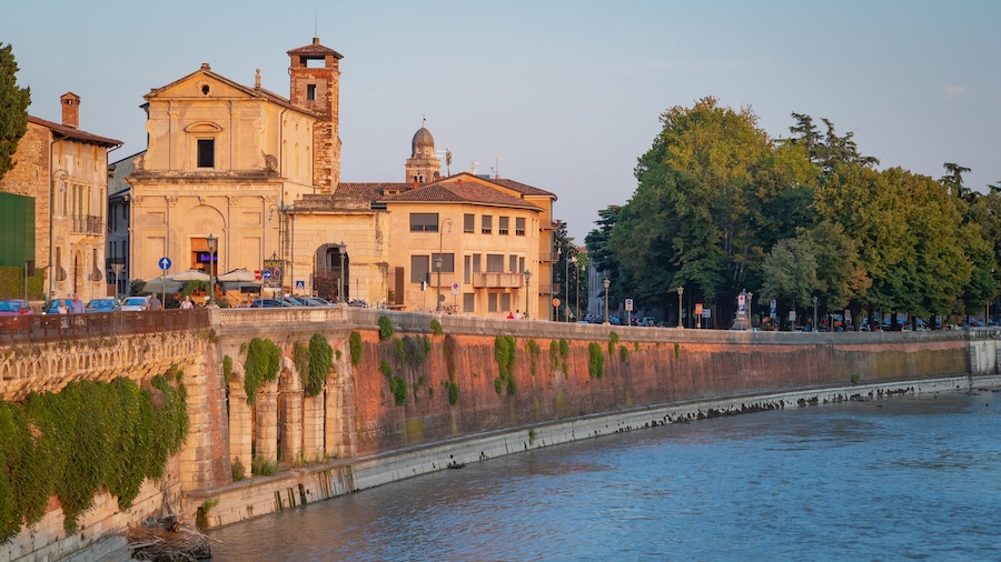 Adige River featuring a sunset, a river or creek and heritage architecture